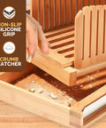 Dope Adjustable Bamboo Bread Slicer With Foldable Slicing Guide And Crumb Tray showing non-slip grip and crumb catcher feature.