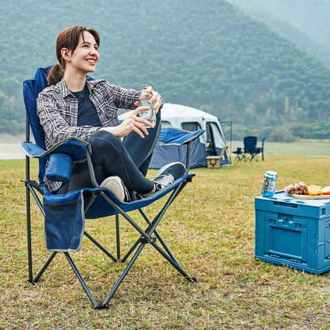 Person sitting on Two Pack Oversized Folding Camping Chair Set With High Back Padded Comfort Grab And Go Style Lightweight Steel Frame