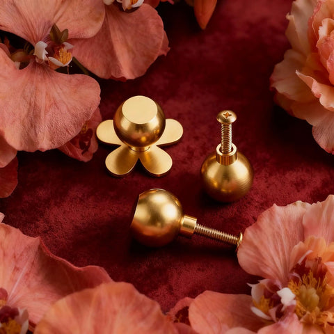 4-Pack Solid Brass Gold Cabinet Knobs With Flower Backplate, on red velvet with flower decor, showing screws and tarnish-resistant finish.