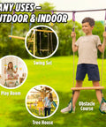Child using Kids Trapeze Bar With 18 Inch Adjustable Height And Gym Rings For Swing Sets Ninja Warrior Obstacle Course.