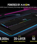 Elite Mechanical Gaming Keyboard With Cherry MX Red Switches And Fire Per Key RGB Lighting features in a gaming setup with AXON tech.