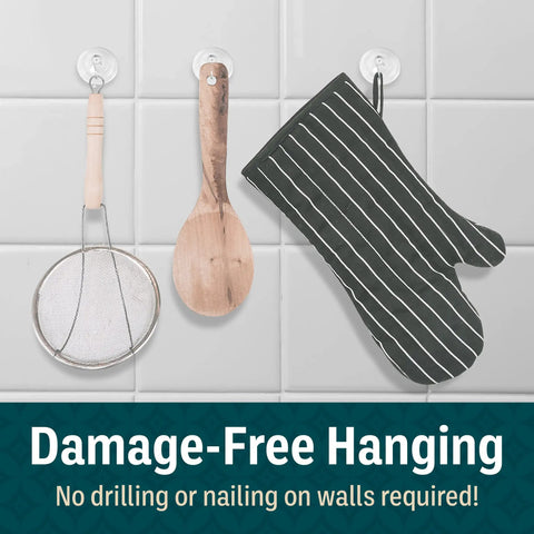 Four Pack Heavy Duty Suction Cup Hooks For Shower Glass Walls Up To Seven Pound Load holding kitchen utensils on tile