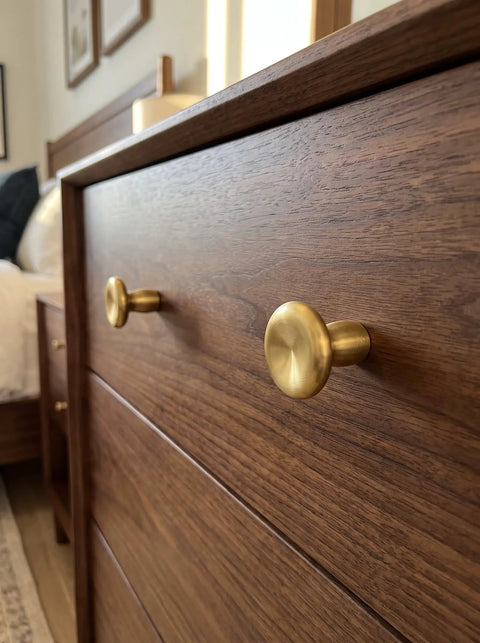 Top Shelf Unlacquered Brass Cabinet Knobs Straight Up Modern Round Dish Hardware Featuring Live Patina Finish 1.18 Inch Face Width For A Cool Kitchen Revamp Two Pack Bundle on wooden dresser.