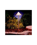 Copper Hammered Roof Path Light With Integrated LED, Outdoor Wet Location Lamp, in garden setting at night, 22-Inch High By 8-Inch Wide