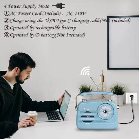 Grab N Go Portable AM FM Shortwave Radio Bluetooth Speaker With Four Power Modes on desk next to laptop and plant