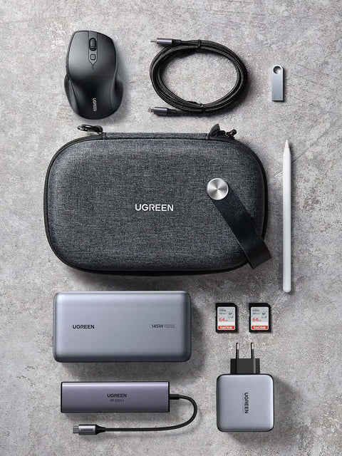 Flat lay of a Built Like A Tank EVA Cable Organizer Travel Case with mouse, power bank, cables, and USB drives.