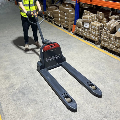 Heavy Duty Mechanics Electric Pallet Jack With 3300 Lbs Lift Capacity And Removable Lithium Ion Battery For Smooth Warehouse Operations in a warehouse.