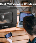 Man using phone near Foldable CNC Enclosure For Small Rigs With Noise Reduction And Dustproof Shield Side Toolbar Universal Fit