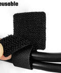 Close-up of Adjustable Reusable Cable Management Kit 40 Pcs Pro Grade with 3 Inch Straps securing black cables.