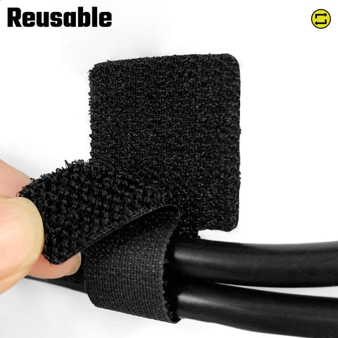 Close-up of Adjustable Reusable Cable Management Kit 40 Pcs Pro Grade with 3 Inch Straps securing black cables.