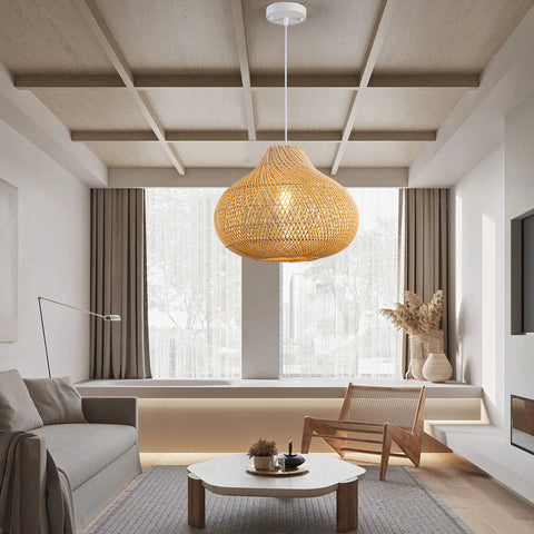Boho Rattan Pendant Light D16.5 Inch Handwoven Wicker Chandelier illuminating modern living room with natural decor.