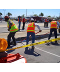 Workers using Asphalt Lute Rake With 32 Inch Blade And 72 Inch Lightweight Aluminum Handle With T Connector for smooth leveling.
