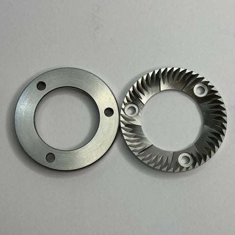 Stainless steel 40mm flat burr blade and base for electric espresso grinders, replacement part visible from above, dual-sided design.