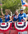 Group with All American Patriotic Bunting Banner Pack With A 4 Pack Of Red White And Blue Half Fan Flags in a parade setting