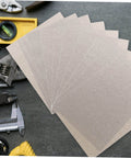 Heat Resistant Microwave Mica Sheet Set, 10 Pieces, with tools on a workbench, waveguide covers for insulation, kitchen use