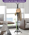Freestanding Coat Rack With 12 Hooks And Umbrella Holder For Entryway Or Hallway Sturdy Metal Tree Stand In Black with bags and umbrellas shown