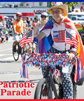 4th Of July Patriotic Bike Decorations Kit For Kids With Red White And Blue Tassels Streamers Tinsel Wheel Spoke Beads American Flags Parade Decor And Rubber Duck Party Favor Fun And Kid Friendly on a bike in a parade