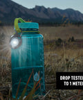 Moonlit Rechargeable Micro Lantern for Camping and Hiking clipped to water bottle in outdoor setting