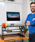 32 Inch Height Adjustable Standing Desk Converter With Slide Out Keyboard Tray And Dual Monitor Riser displayed in a home office.