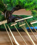 Mini Zen Garden Rake Stamp Set For Desk Stress Relief And Focus Dope Rock Sand Garden Accessories displayed with bamboo tools and figurines.