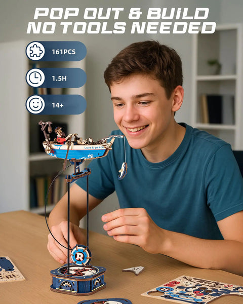 Teen assembling 3D Wooden Puzzle Kit For Adults Featuring Gravity Swing Ship Model And Aircraft Model.