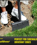 Person using Flat Shovel Heavy Duty Garden Tool With Long Handle on garden edge, 60-inch length, quenched steel blade visible.
