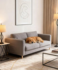Living room with 3 Piece Farmhouse Black Lamp Set With Oatmeal Fabric Shades, including table and floor lamp near a sofa.