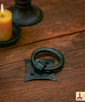 Mystic Colonial Cast Iron Ring Pull Handles With Screw Blackened Hammered Finish Antique Cabinet Hardware on wood surface
