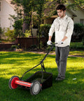 Red 14 Inch 5 Blade Push Reel Mower With Removable Grass Catcher For Small To Medium Yards Durable Steel Blades Clean Cuts Easy Maneuver Quiet Eco Friendly Lawn Care, man mowing lawn