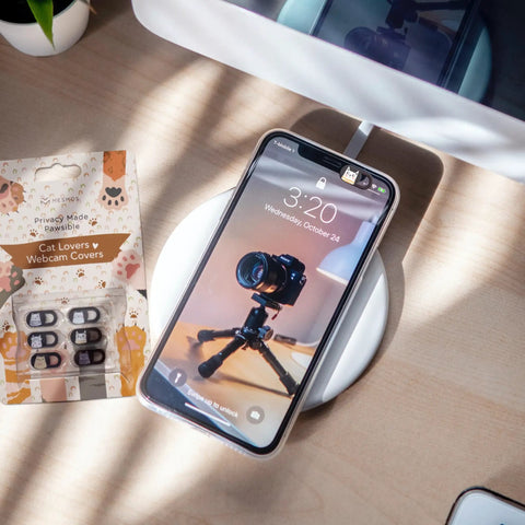 Slick Little Webcam Cover Slide For Laptops And Macbooks Featuring Adorable Cat Vibes on phone with tripod camera.