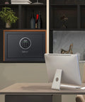 Fingerprint Safe Box For Home Security Grab And Go Quick Access Safe installed in office, compact design with control panel visible.