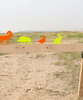 Range Ready Neon Color Steel Animal Silhouette Targets 4 Pack High Visibility Knockovers on wooden stand outdoors