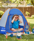 Child using binoculars with Kids Camping Set With Pop Up Tent And Outdoor Gear For Pretend Play Adventures in blue tent