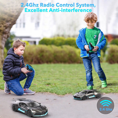 Children playing with Bugatti Divo 1 To 12 Scale Remote Control Car Licensed Two Point Four Gigahertz RC Model outdoors