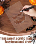8Pcs Halloween Acrylic Router Templates Set for Scary Pumpkin Face Carving and Door Mats Stencils on wooden surface.