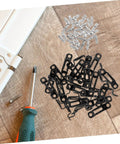 30 Pack Heavy Duty Metal Furniture Connectors Rock Solid No Slack Hidden Assembly Hardware For Cabinets Bookcases And Sofas Tight Hold Zero Play Hassle Free Setup with black steel connectors and screws.
