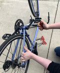 Person using Cushion Grip Hex T Key Allen Wrench Set, 11 Piece, SAE Inch Sizes 5/64 To 3/8, 12 Inch Series to repair bicycle