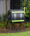 48 Gallon Compost Tumbler With Cart Dual Compartment Geared System For Easy Emptying Elevated Base With Turning Lock Ratchet in garden