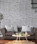 Living room with Grey Faux Brick Peel And Stick Wallpaper Roll 17.7 By 472 Inches Self Adhesive Vinyl Film as feature wall decor