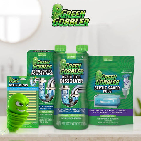 Green Gobbler cleaning products including drain sticks, dissolver, and septic saver pods displayed on a counter.