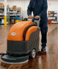 22 Inch Walk Behind Commercial Floor Scrubber Cordless Battery Powered With Dual 13 Point 2 And 14 Point 5 Gallon Tanks Up To Five Hours Runtime 31 Inch Squeegee Hard Floor Cleaner For Tile Concrete Epoxy And Vct in use on wooden floor