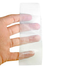Kickass Heavy Duty Clear Duct Tape 2 Inch By 30 Yard Roll held in hand, showcasing woven backing and transparency for repairs.