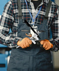 Mechanic holding DIY Auto Body Dent Repair Kit With Wheel Arch Marker And Iron Tool For Sheet Metal Restoration