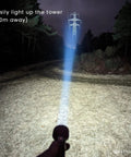 Rechargeable LED Flashlight With 2100 Lumen Output And 690 Meter Throw For Serious Long Range Illumination lighting up a tower
