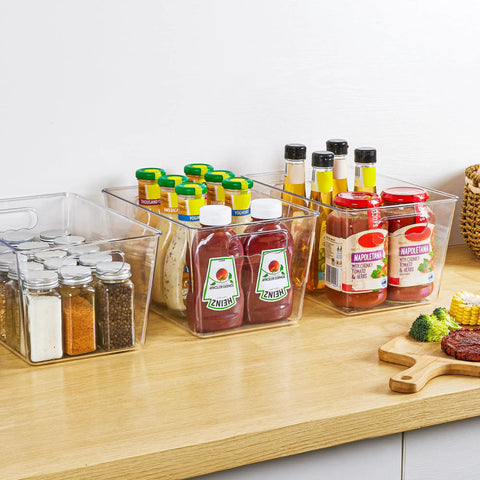 Straight Fire Kitchen Organization To Keep The Mess Tight With This Six Pack Of Large Clear Pantry Bins Boasting Heavy Duty Handles For Fridge Cabinet Freezer Sorting, filled with sauces and spices on a wooden countertop.