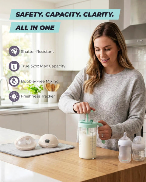 The Go To Rock Solid Borosilicate Glass Breast Milk Pitcher With 32 Oz And Upgraded Bpa Free Mixing Spoon For Heat Safe No Sweat Nursing Mom Storage in use with milk.