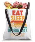 Vintage Dragon Boat Team Tote Bag For Paddlers And Crew Dragon Boat Racing Gear For Practice And Race Day 16 By 16 Inch Durable Canvas Tote displaying 'Eat. Sleep. Dragon Boat. Repeat.' with groceries and flowers.