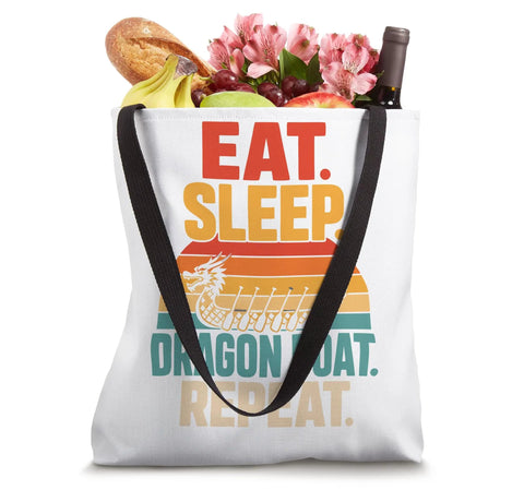 Vintage Dragon Boat Team Tote Bag For Paddlers And Crew Dragon Boat Racing Gear For Practice And Race Day 16 By 16 Inch Durable Canvas Tote displaying 'Eat. Sleep. Dragon Boat. Repeat.' with groceries and flowers.
