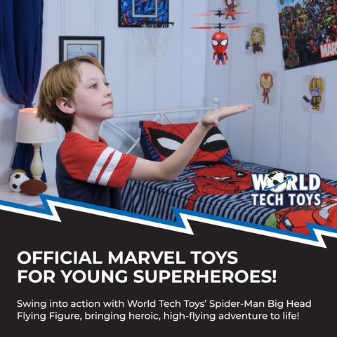 Child playing with Marvel Spider Man Big Head Helicopter Toy With Motion Sensing Flight in bedroom setting, toy in motion.