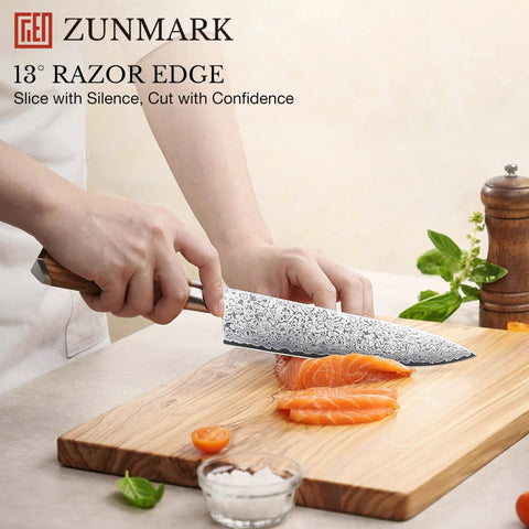 Eight Inch Damascus Steel Chef Knife With A Smooth Olive Wood Handle And Razor Sharp 10Cr15CoMoV Core slicing salmon on wood board.